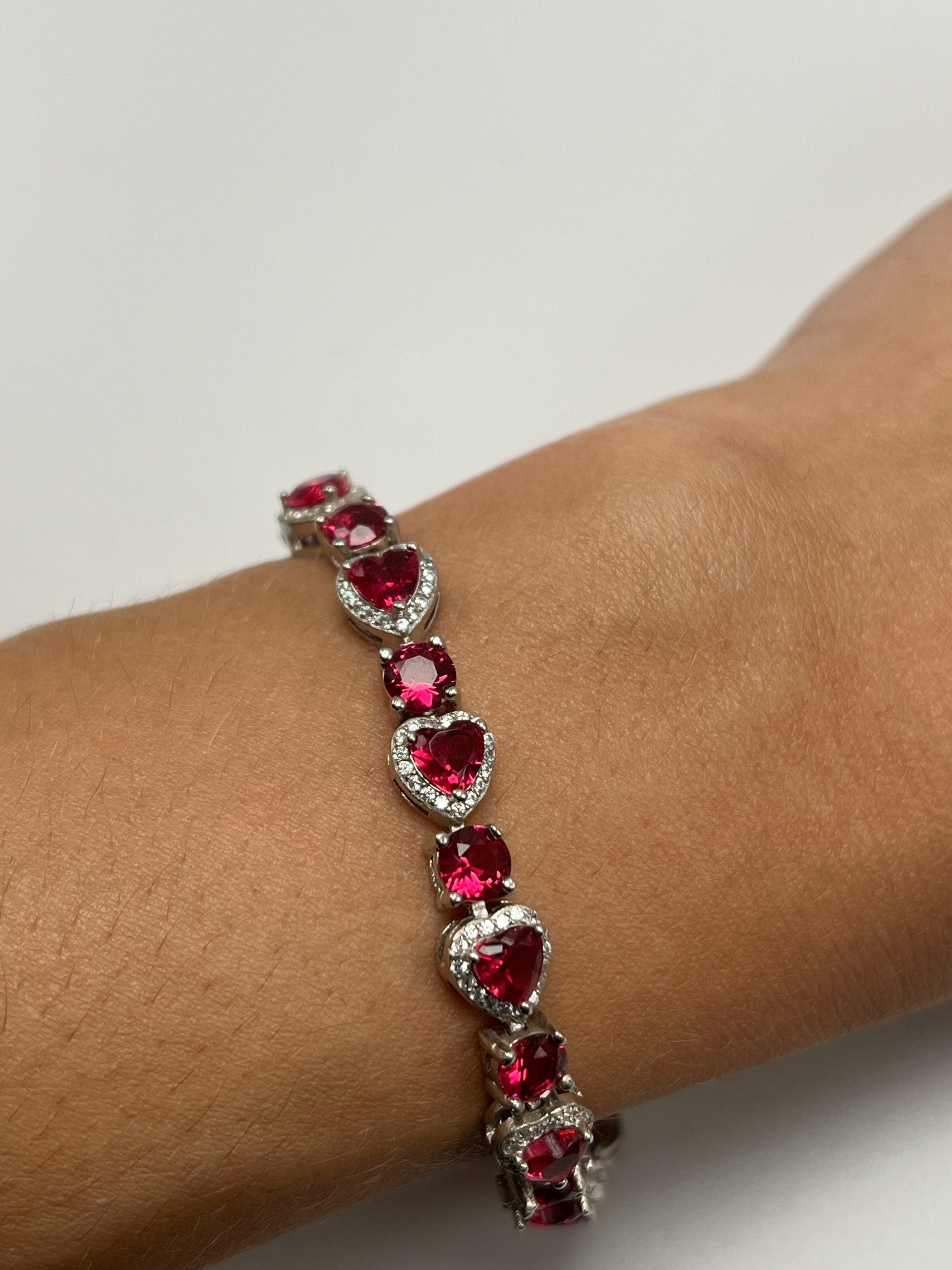 Sterling silver tennis bracelet with pink crystals