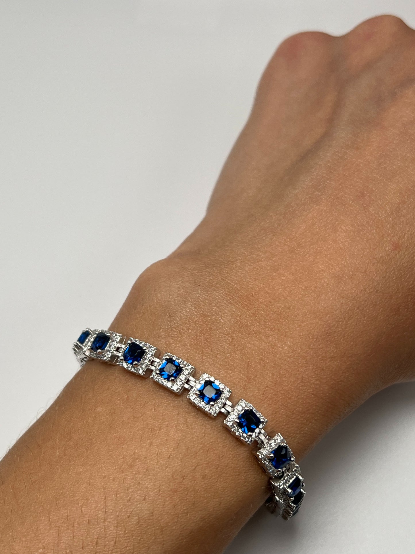 Sterling silver tennis bracelet with blue crystals