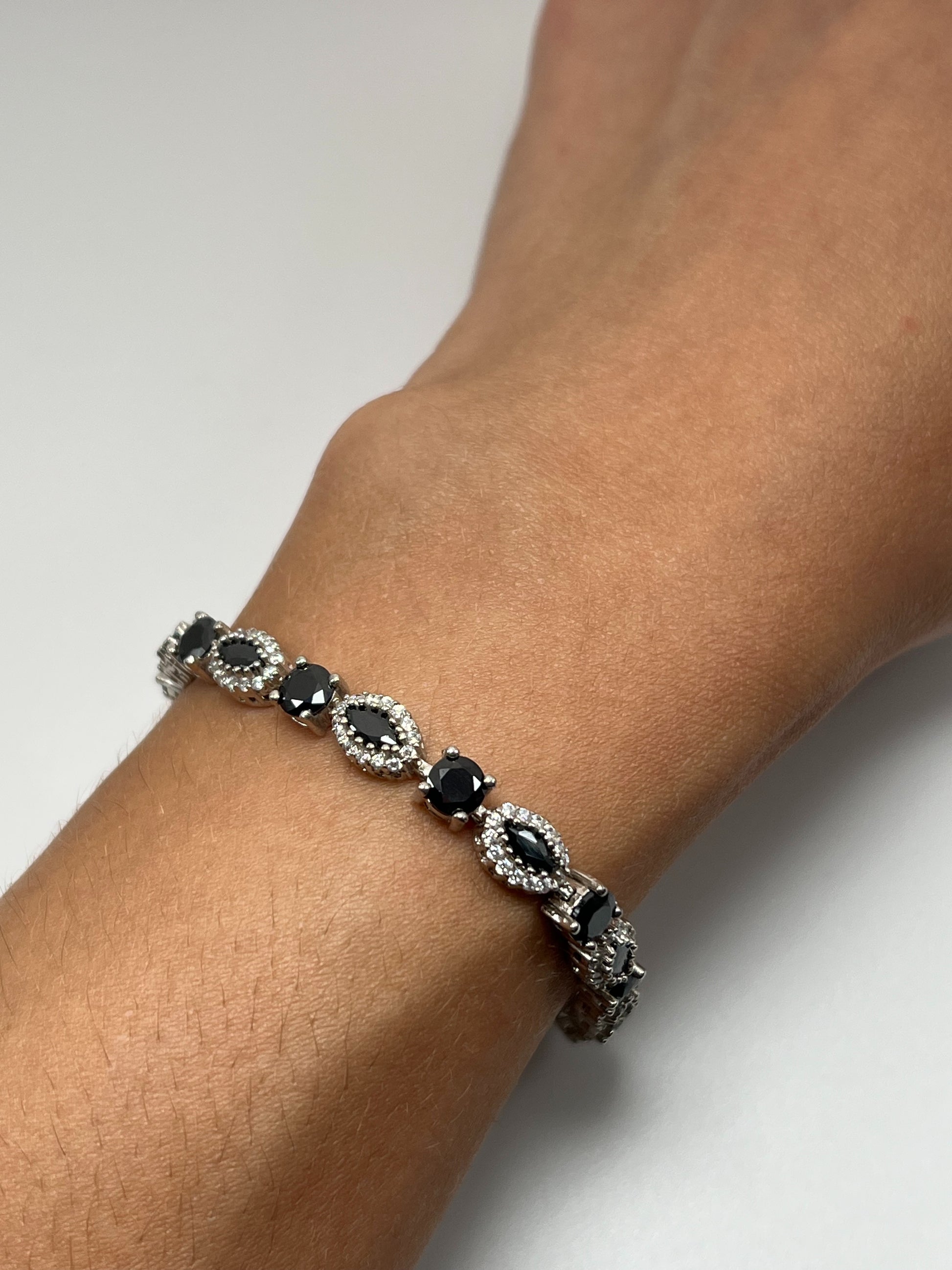 Sterling silver tennis bracelet with black and white crystals