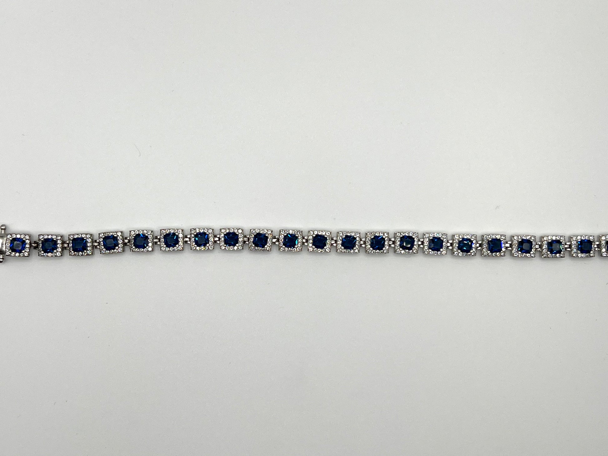 Sterling silver tennis bracelet with blue crystals