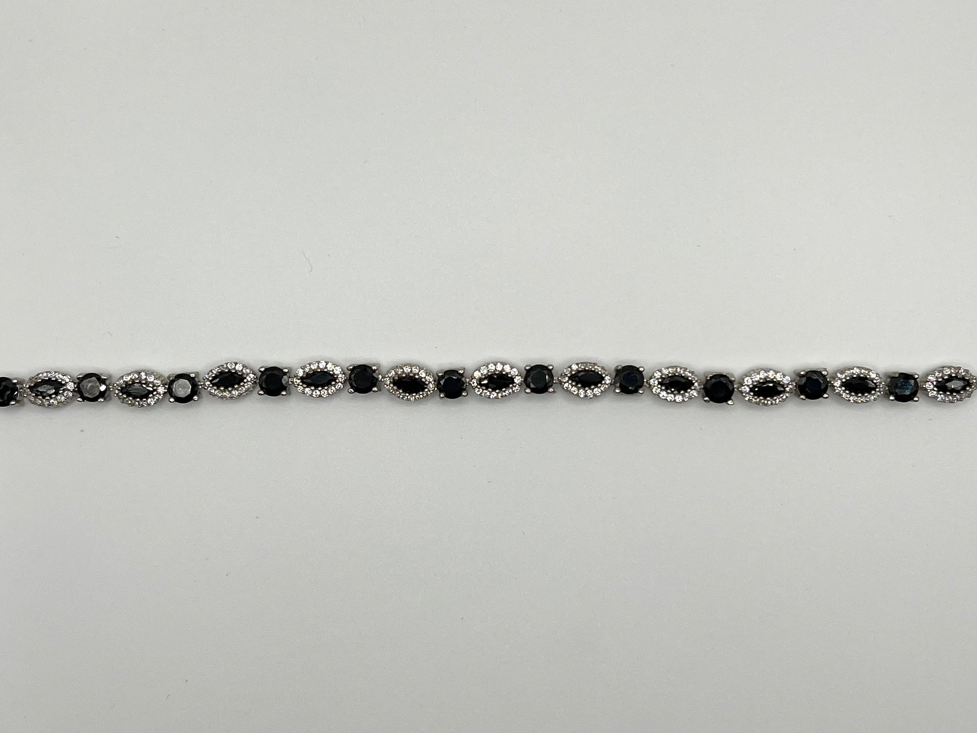 Sterling silver tennis bracelet with black and white crystals