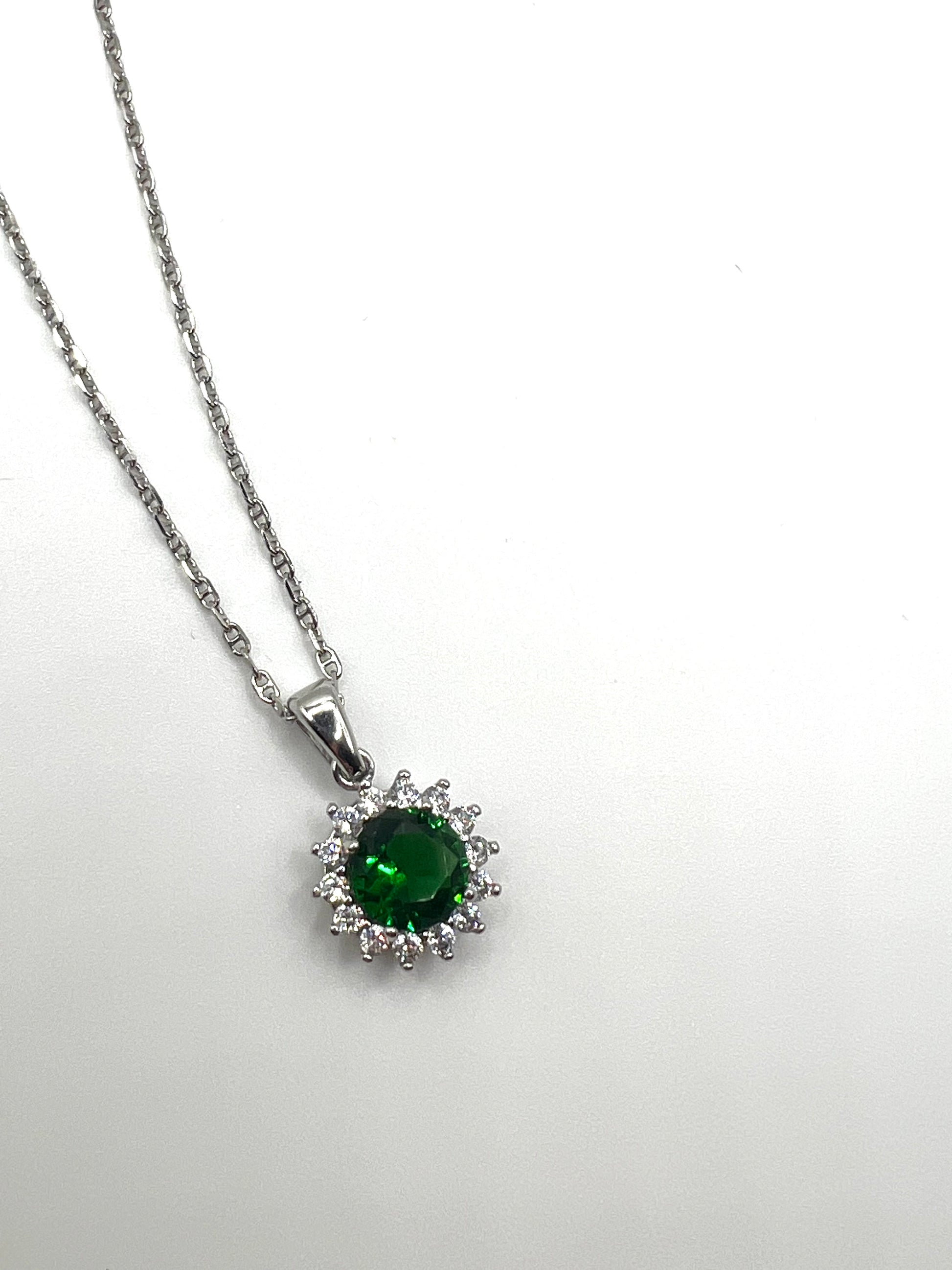 Sterling silver necklace with green crystal pendant