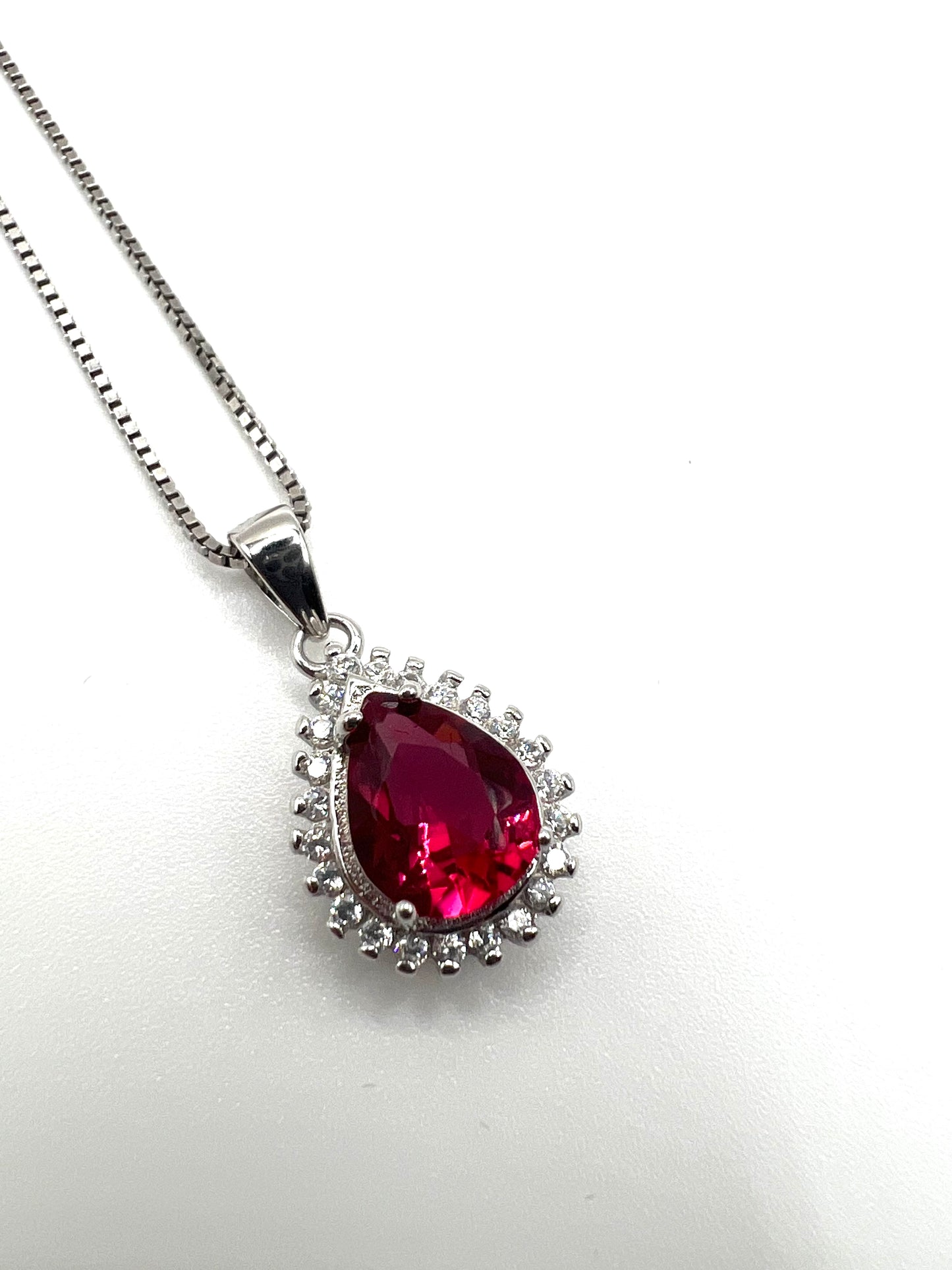 Sterling silver necklace with pink crystal pendant