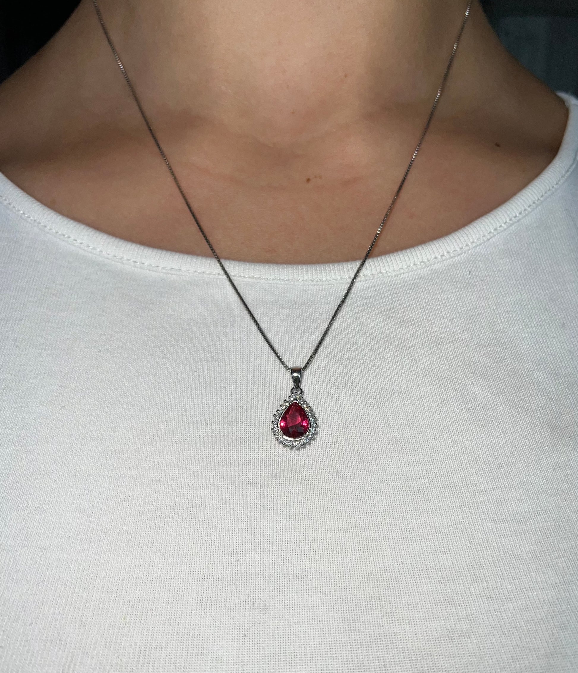 Sterling silver necklace with pink crystal pendant