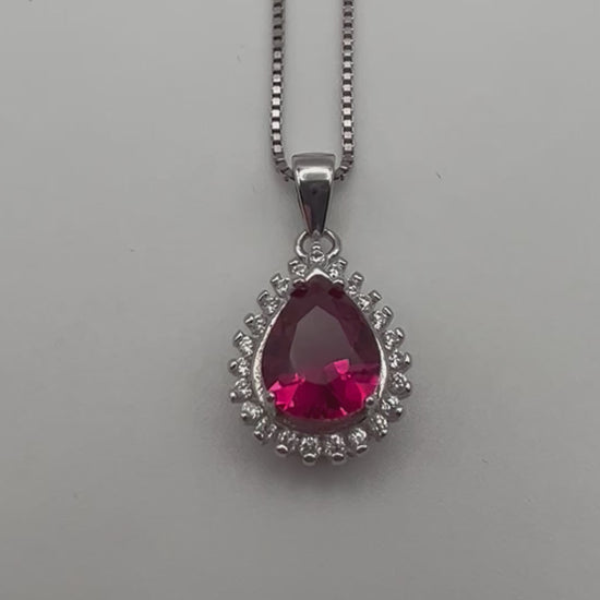 Sterling silver necklace with pink crystal pendant