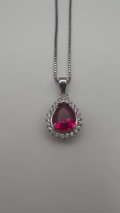 Sterling silver necklace with pink crystal pendant