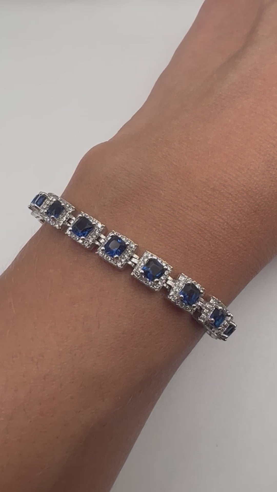 Sterling silver tennis bracelet with blue crystals