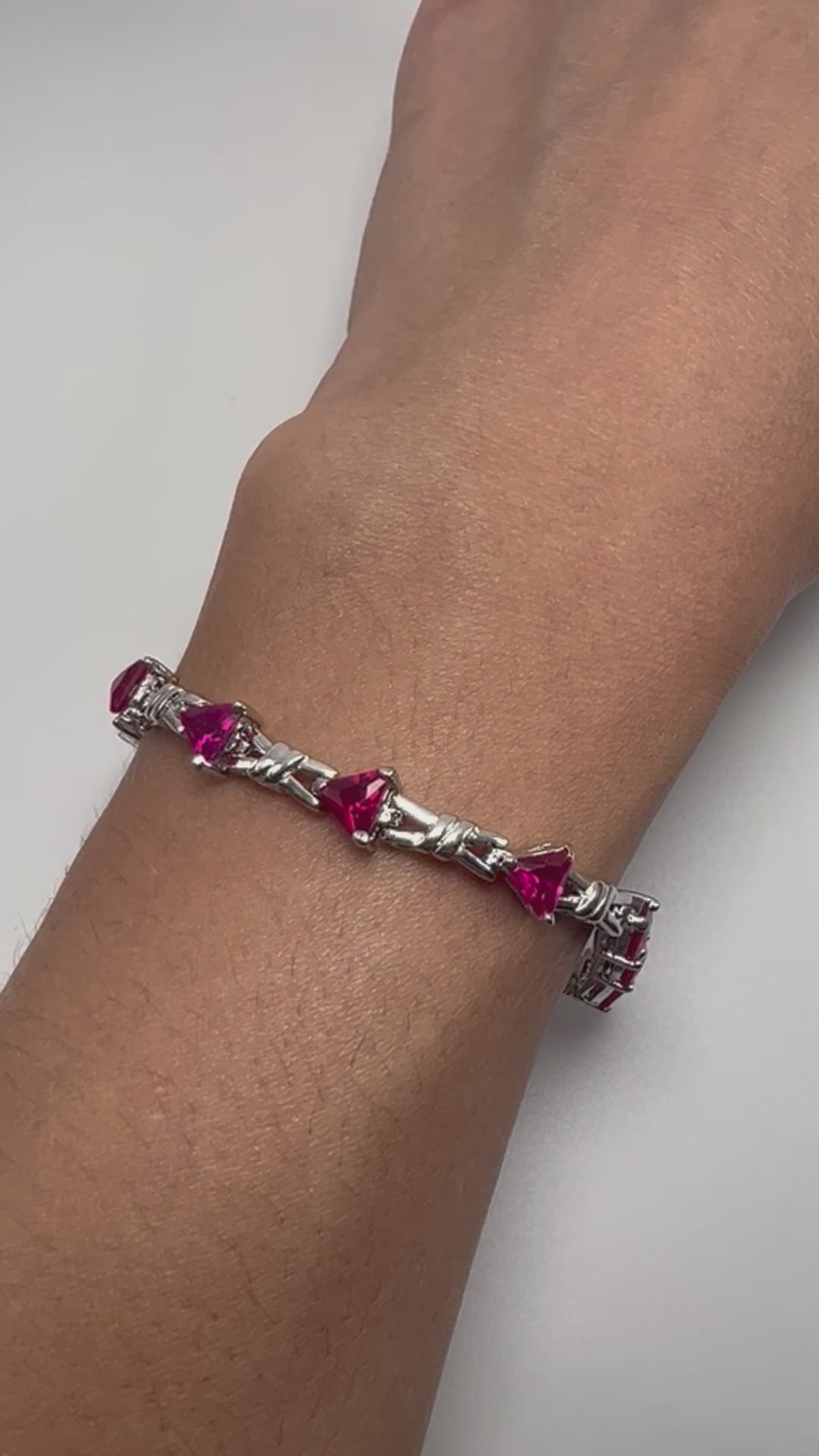 Sterling silver tennis bracelet with pink crystals